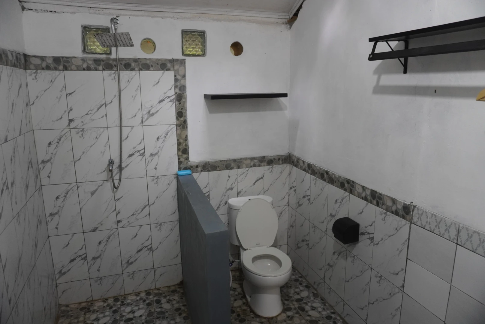 Modern bathroom in guest accommodation at Krui Surf Camp